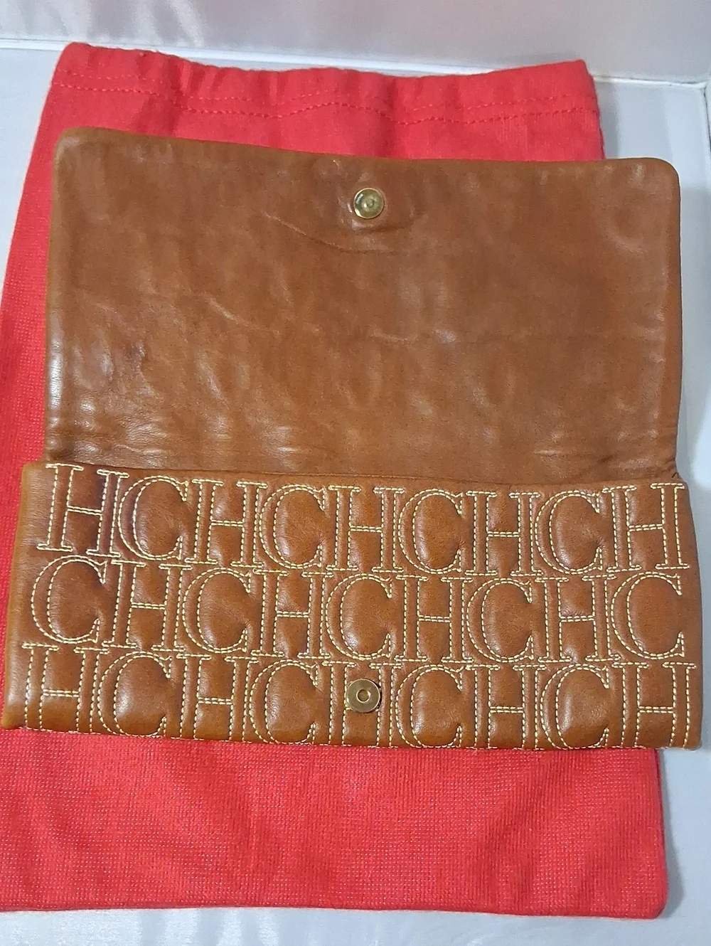 Carolina Herrera glove keather clutch